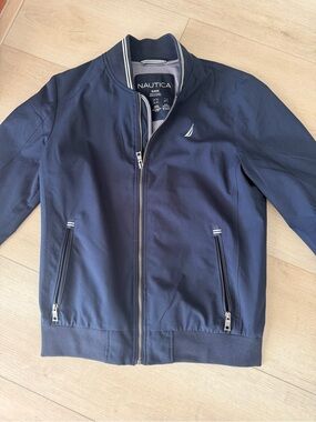 Nautica Men's Navy Blue Zip Bomber Jacket with Sail Logo.